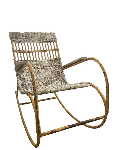 With its metal frame and wicker/straw seat and back, this Vintage Metal Framed Rocking Chair is sure to provide comfortable seating for years to come. The wooden arms and mustard yellow paint offer a classic aesthetic that will bring a unique patina to your home. Enjoy the nostalgic feeling of a good old-fashioned rocking chair, but with the added resilience of metal.