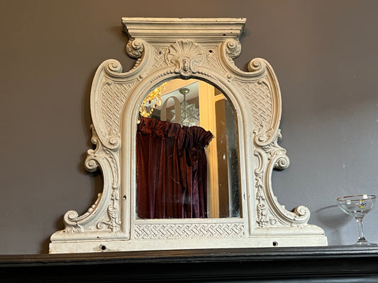 Two Victorian Cast Iron Over Mantle Mirrors. Unique -' one of a kind'  pieces that  would suit a mix of interiors.   These  decorative Over Mantles have been cast from iron with decorative motifs throughout and with the original mirrors in situ.   The blue overmantles' mirror  has been  repaired  using the Japanese Kintsugi method,  which roughly translates as 'joining with gold'