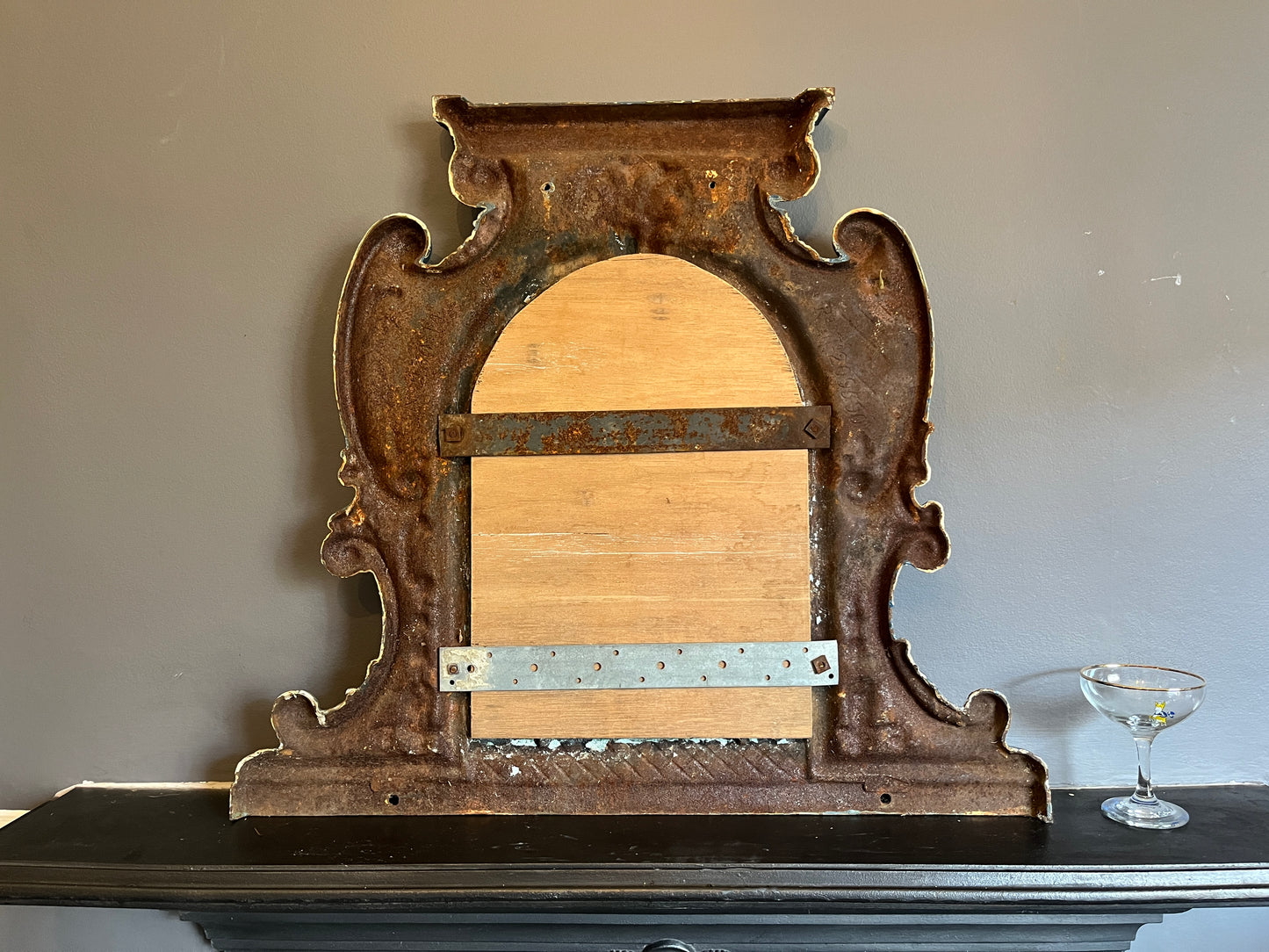 Two Victorian Cast Iron Over Mantle Mirrors. Unique -' one of a kind'  pieces that  would suit a mix of interiors.   These  decorative Over Mantles have been cast from iron with decorative motifs throughout and with the original mirrors in situ.   The blue overmantles' mirror  has been  repaired  using the Japanese Kintsugi method,  which roughly translates as 'joining with gold'